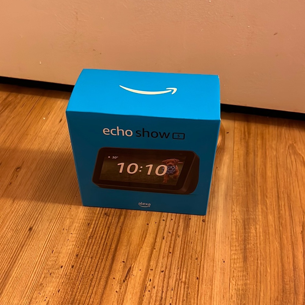Echo show 5. New never used, packaging not even opened. SELLING AS IS!!!